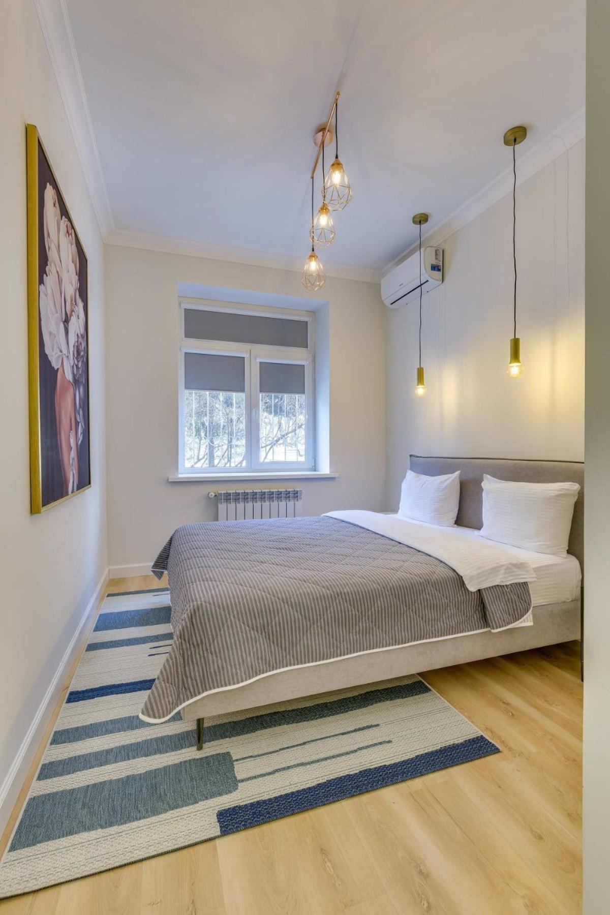 Opera Apartments Алма Ата Стая снимка