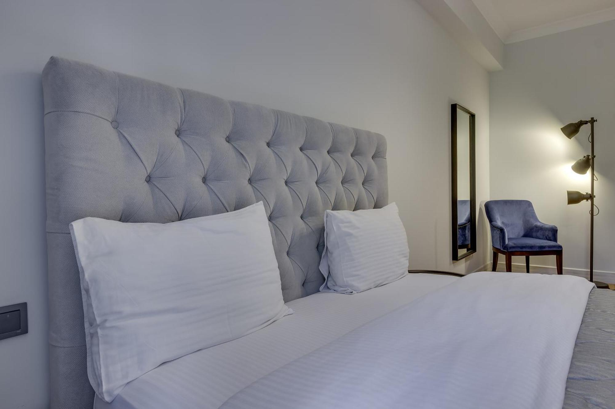 Opera Apartments Алма Ата Стая снимка